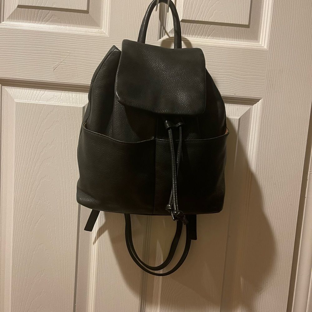 Tignanello Leather Black small Backpack string straps closure.